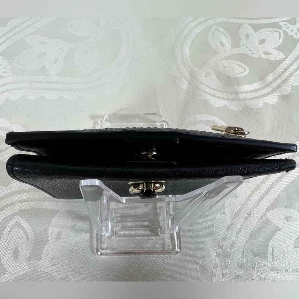 1017: Furla Black Pebbled Leather Compact Bifold Wallet